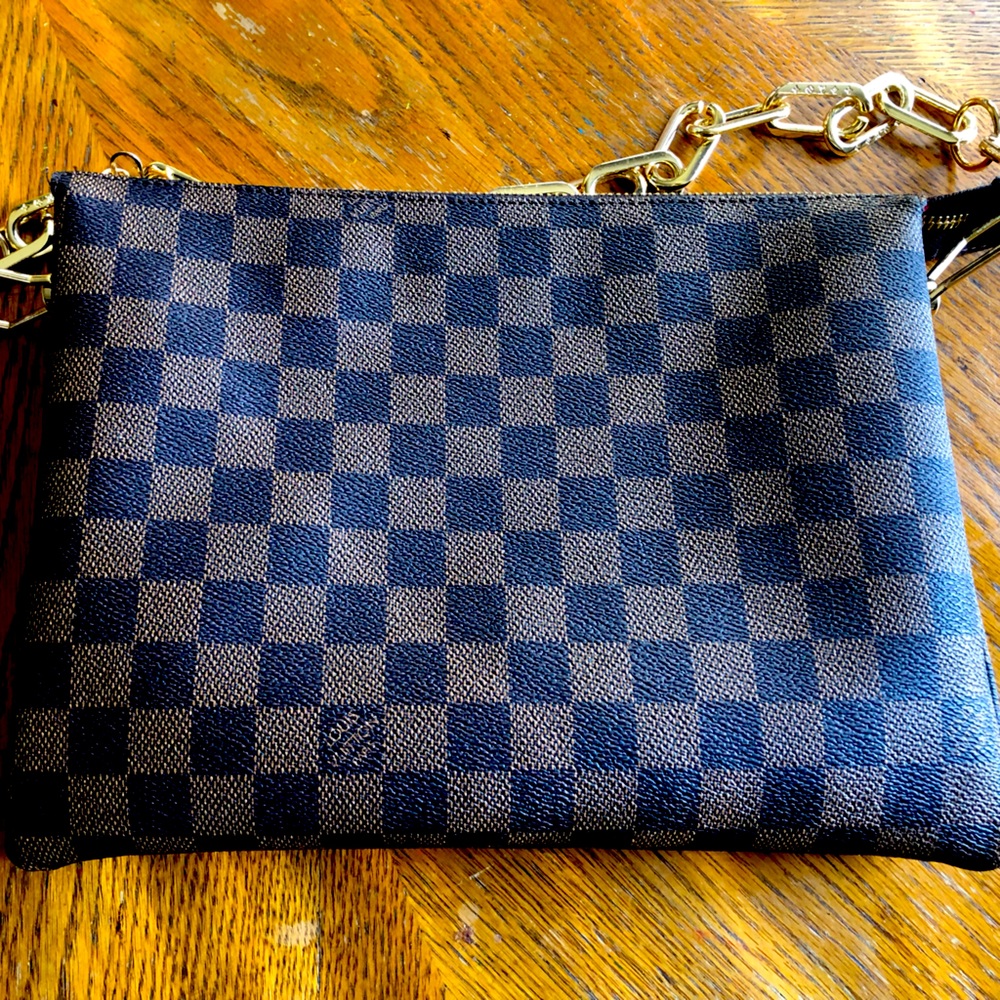 LV designer. Great fall item, goes with everything!